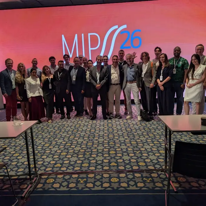Faculty and delegates group photo on the MIPSS 2026 main stage