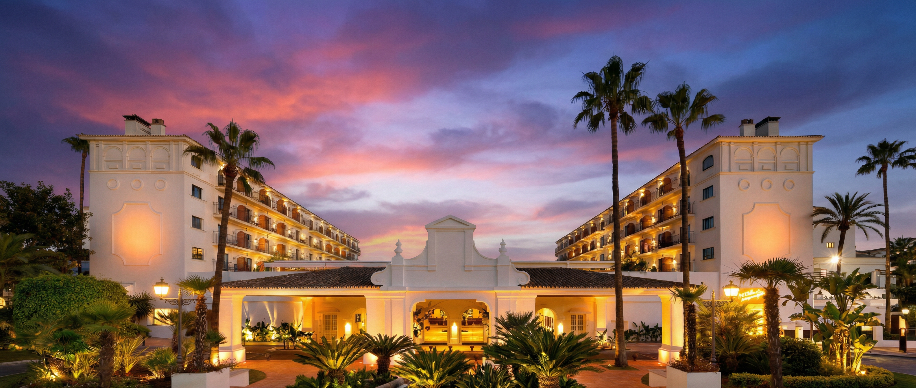 Luxury Mediterranean resort at sunset in Marbella